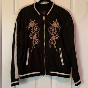 Black bomber jacket with floral embroidery